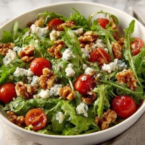 Fresh Arugula Blue Cheese Salad with walnuts and vinaigrette dressing